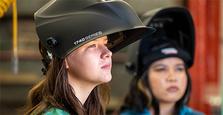 welding students in class