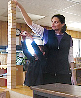 Adult with blocks